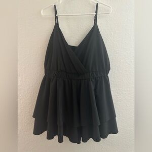 Black tank-top romper.